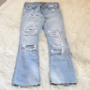 Acid washed Abercrombie ripped jeans with flare